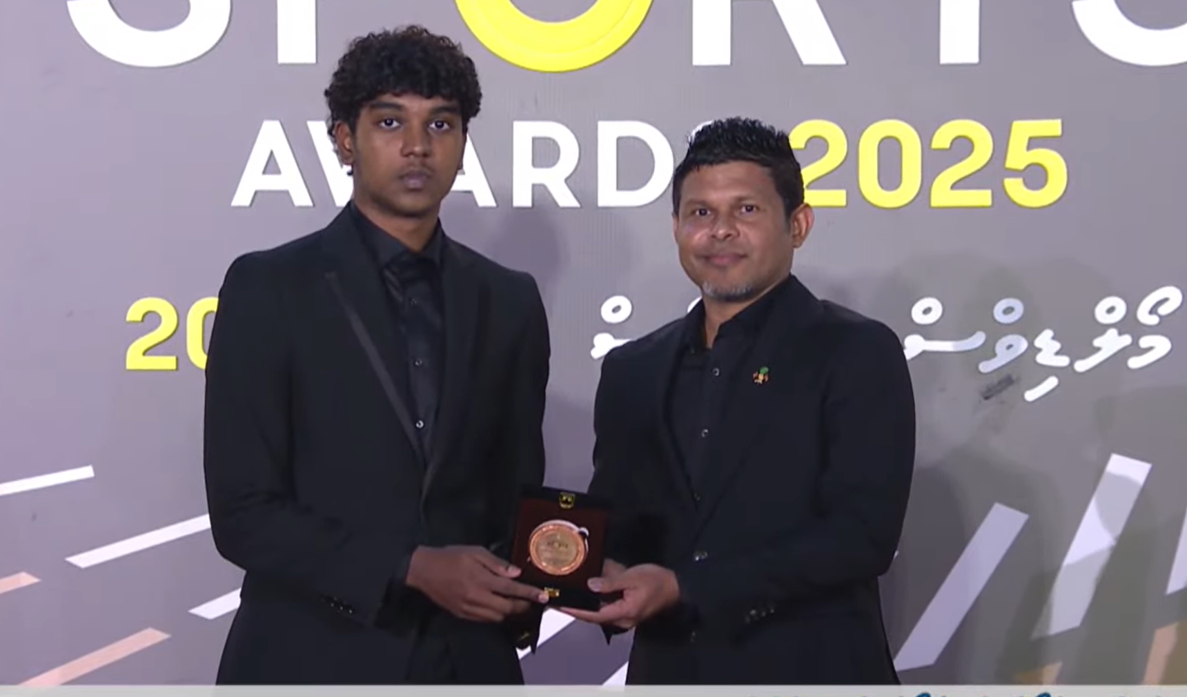 Bronze Award for Elite Young Athlete Presented to Umair by President's Family